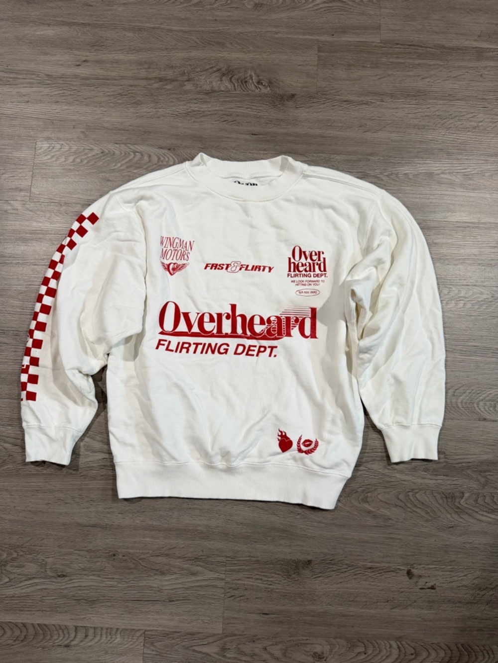 Overheard Flirting Dept. White Crewneck Sweatshirt with Red Graphics